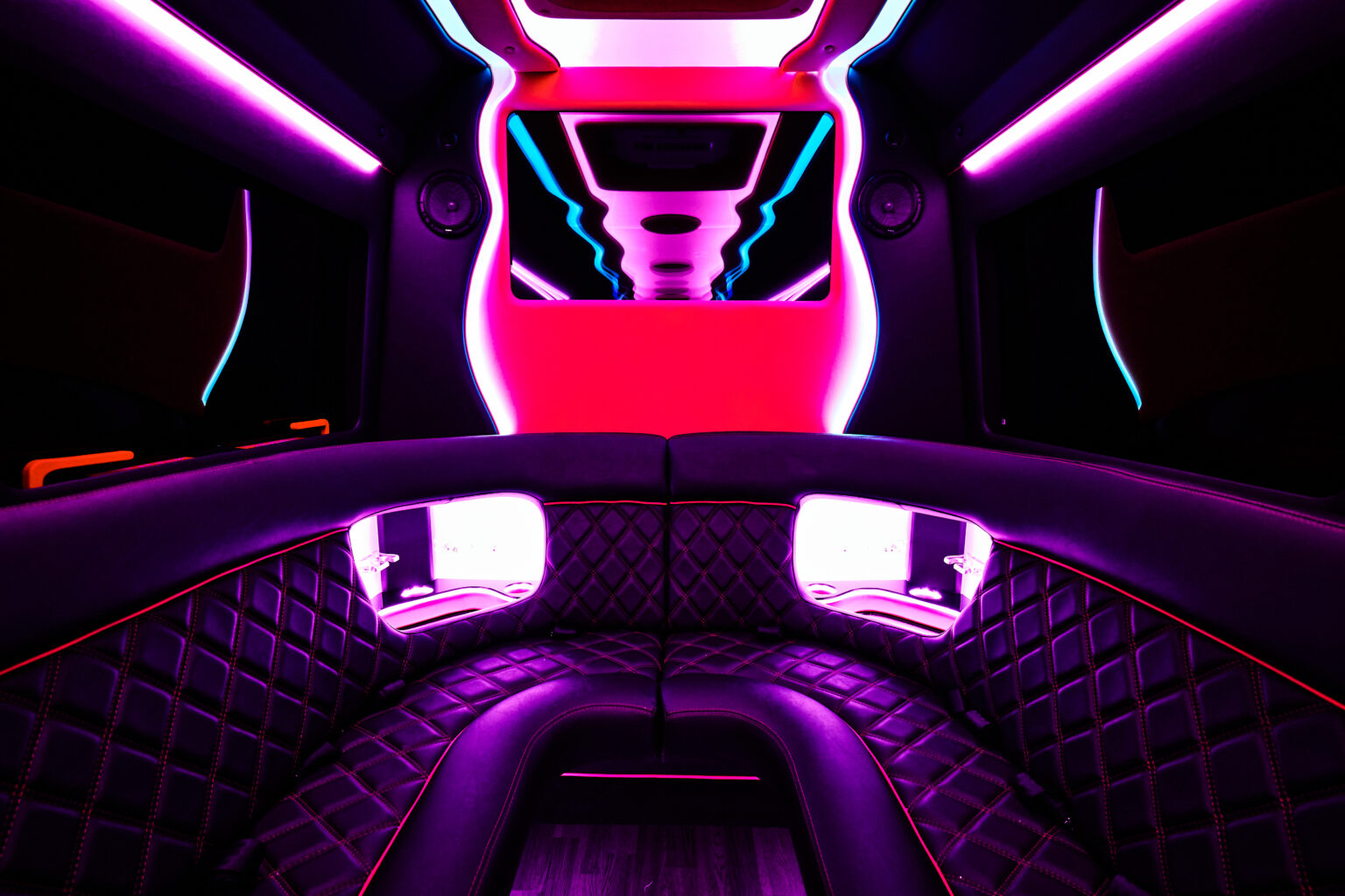 Luxurious, neon-lit interior of limousine