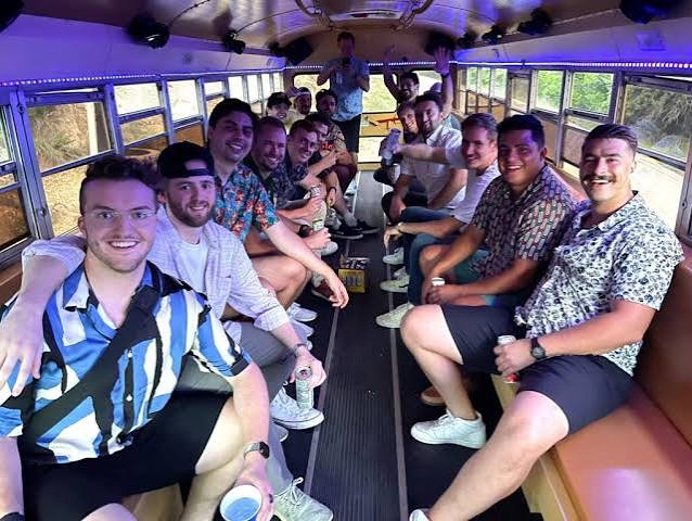 Exciting Bachelor Party Bus Rental Las Vegas 3 Group of friends on a bus