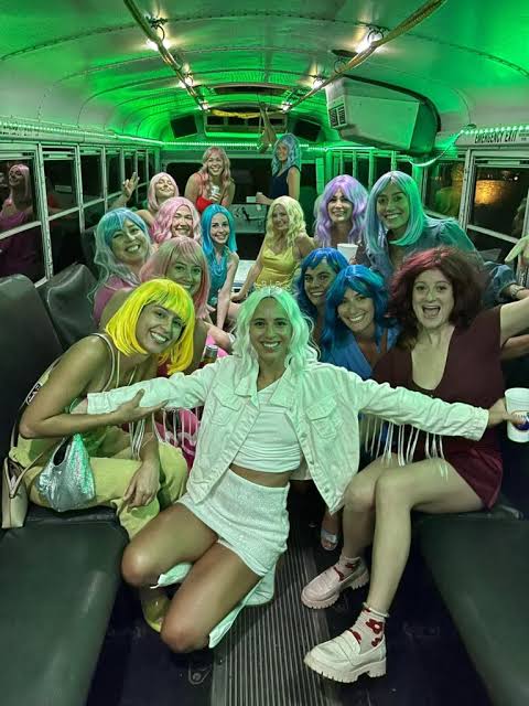 #1 Official Las Vegas Party Bus Rentals Experience - Home 2 girls partying on a a Las Vegas Party Bus Rentals Bus.