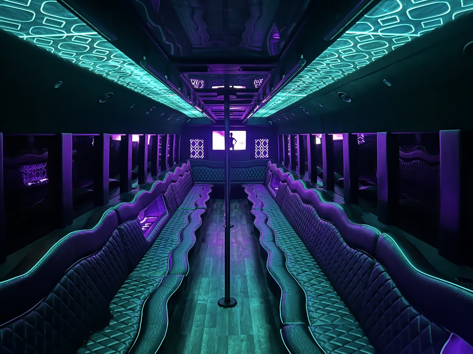 inside a Las Vegas Party Bus Rentals Bus with blue neon lights